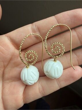 Gold tone Spiral Earrings with Carved White Beads
